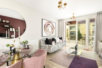 A modern, open-plan living dining area with access to balcony