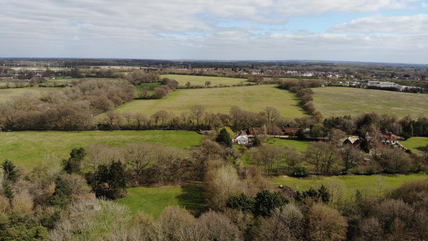 An aerial view of countryside fields in Essex