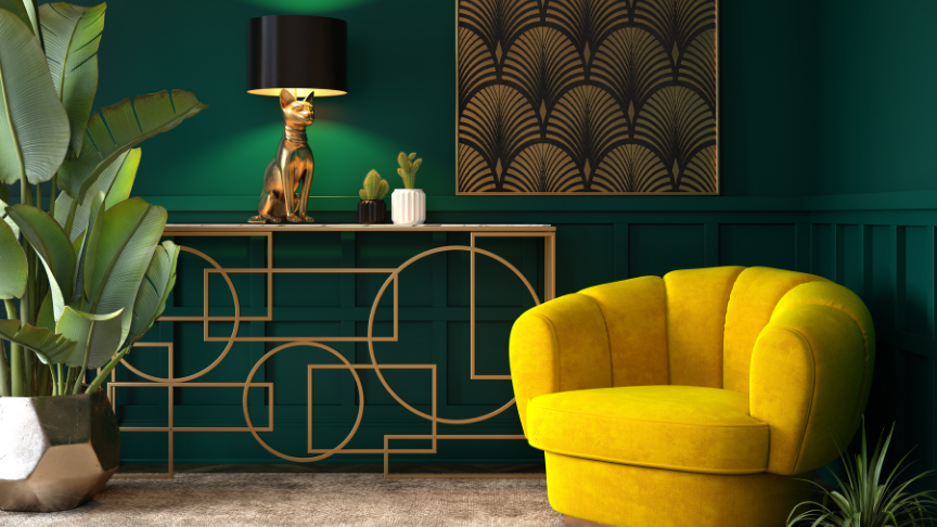 A tastefully decorated living room in deep greens with gold and mustard yellow features